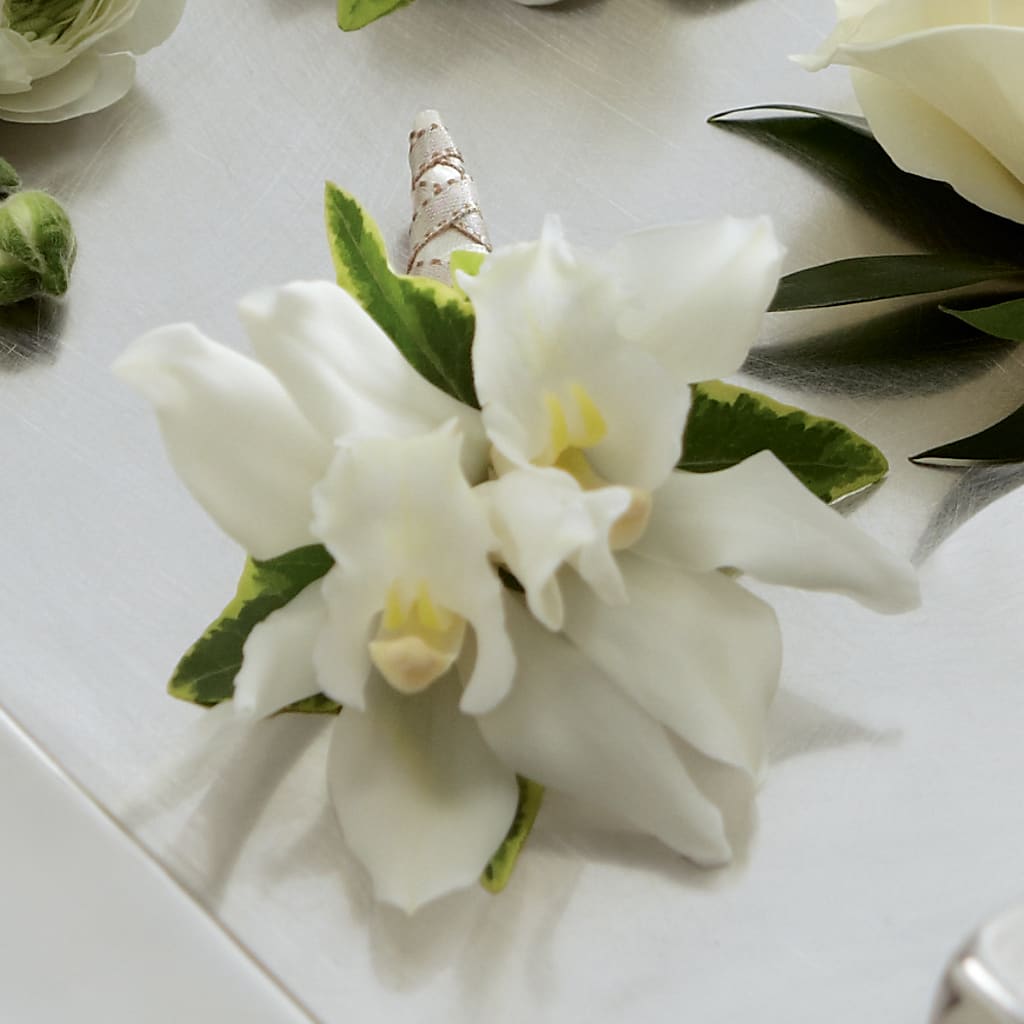 White Mini Cymbidium Boutonniere – DANI' SWEET DELIGHTS, Las Vegas NV